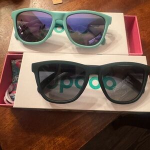 Two Pairs, Goodr Sunglasses, 90’s sedan style icon & electric dinotopia carnival